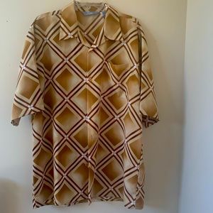 Men’s casual shirt; straight bottom - made to wear outside the pants.